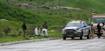 Localizan cuerpo encobijado en la carretera libre Tijuana - Tecate